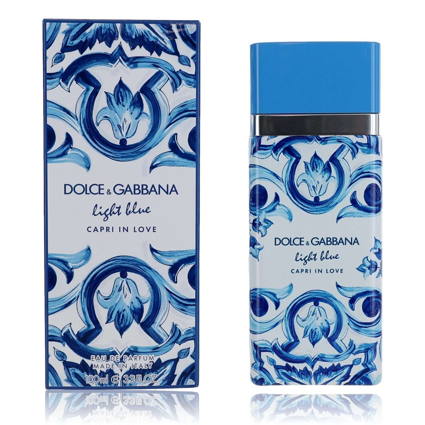 Dolce & Gabbana perfume spray bottle, light blue glass with blue floral label.