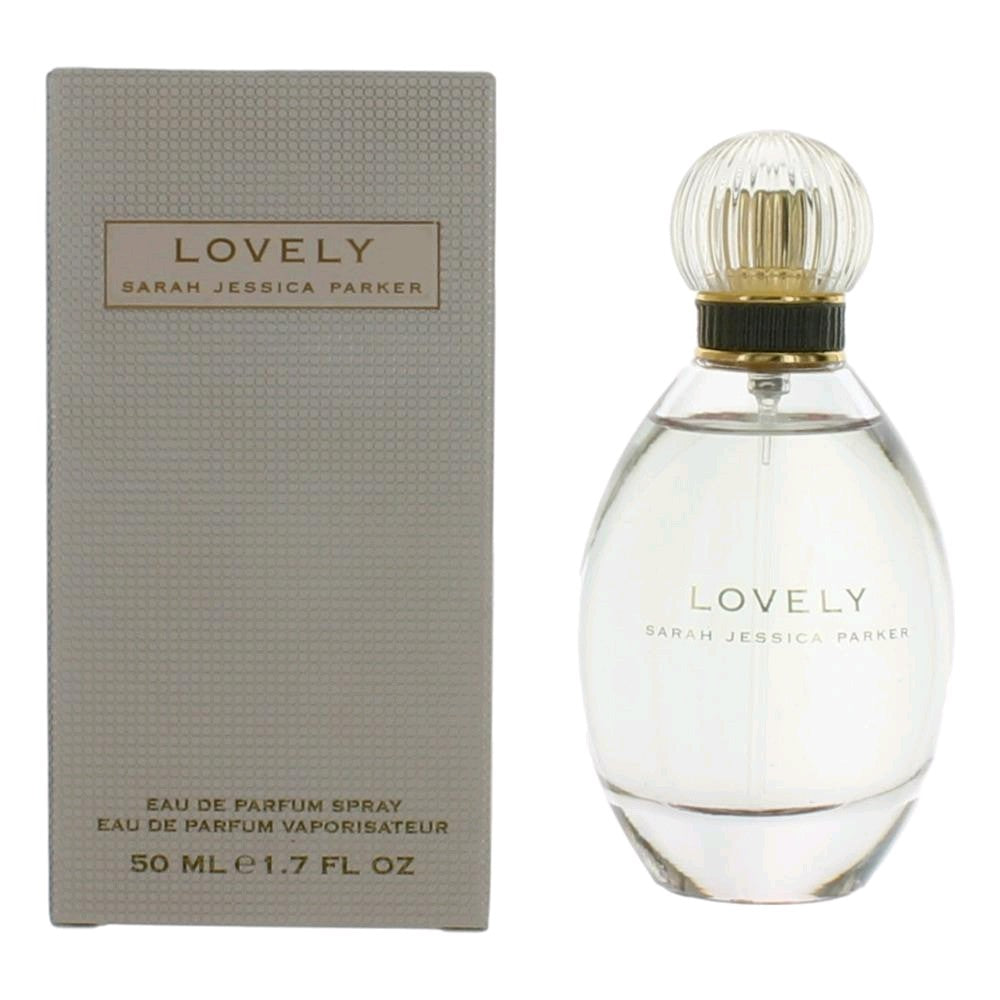 Lovely Eau de Parfum spray bottle with matching box, clear glass and gold accents
