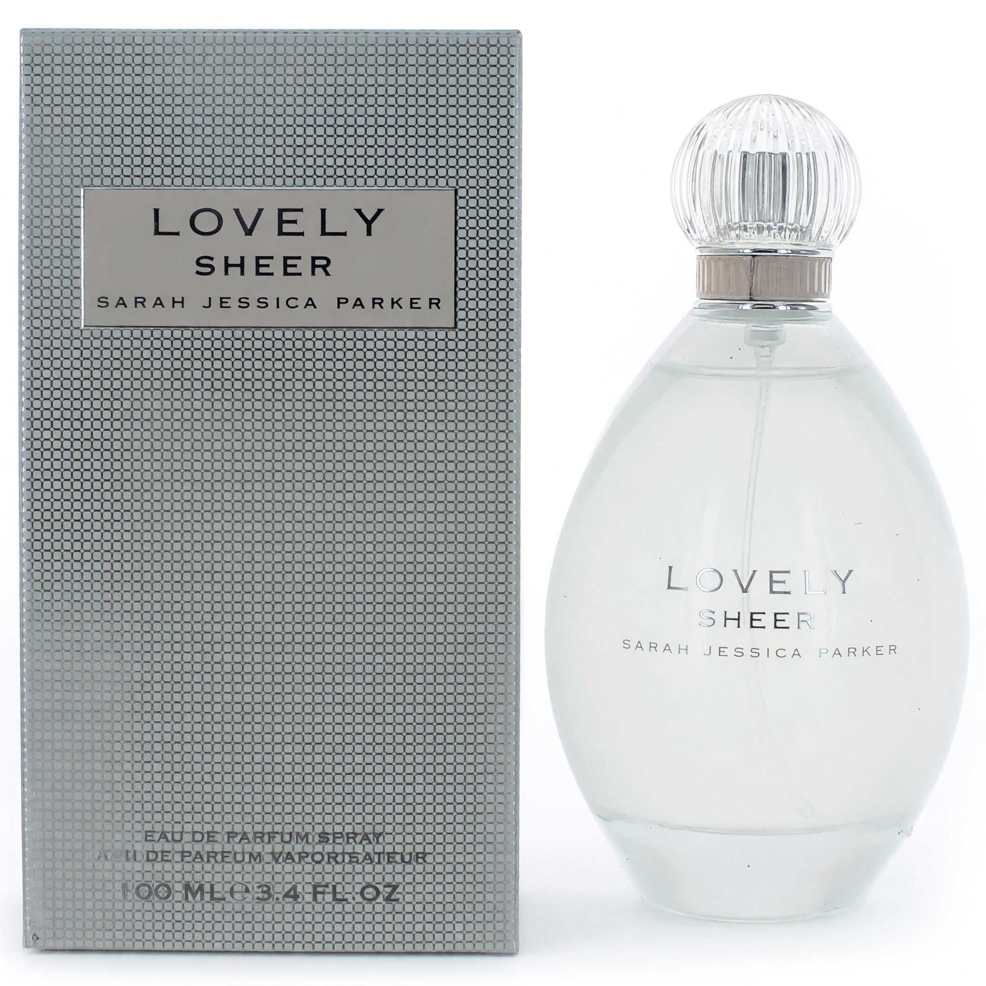 Lovely Sheer eau de parfum spray bottle and box, clear glass with silver cap