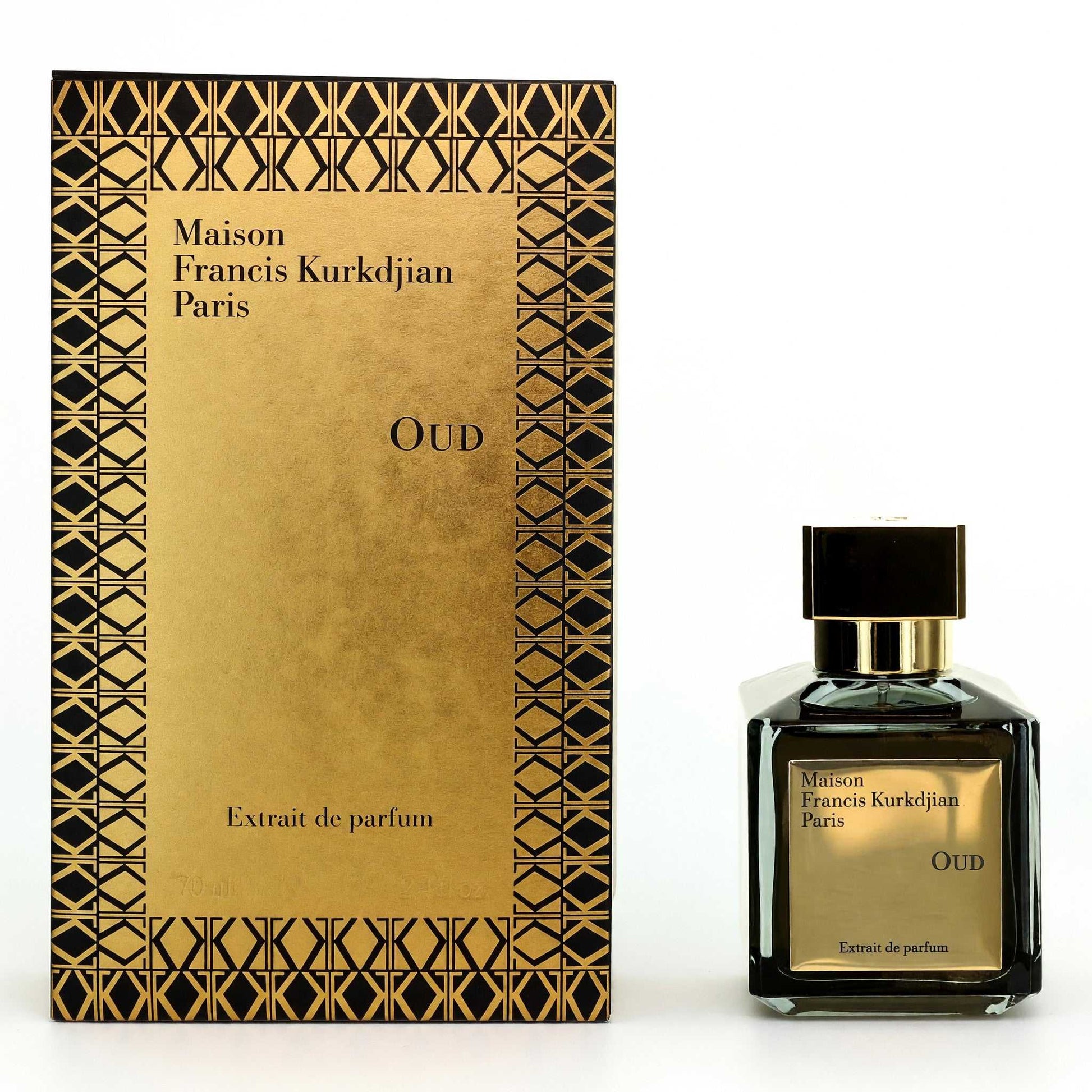 Extrait de parfum spray bottle with gold cap and matching Oud box