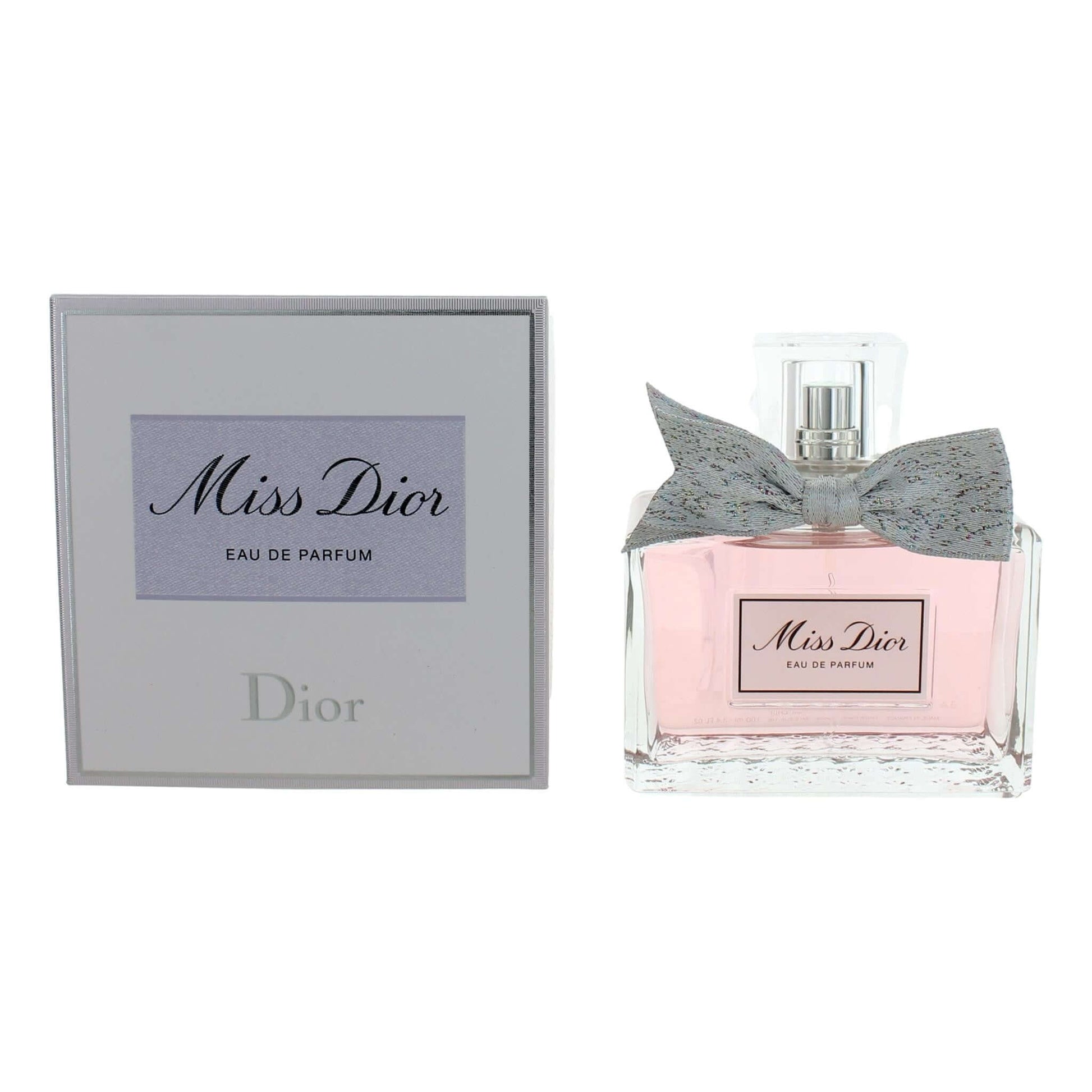 Women’s eau de parfum spray with pink bottle and gray Miss Dior packaging