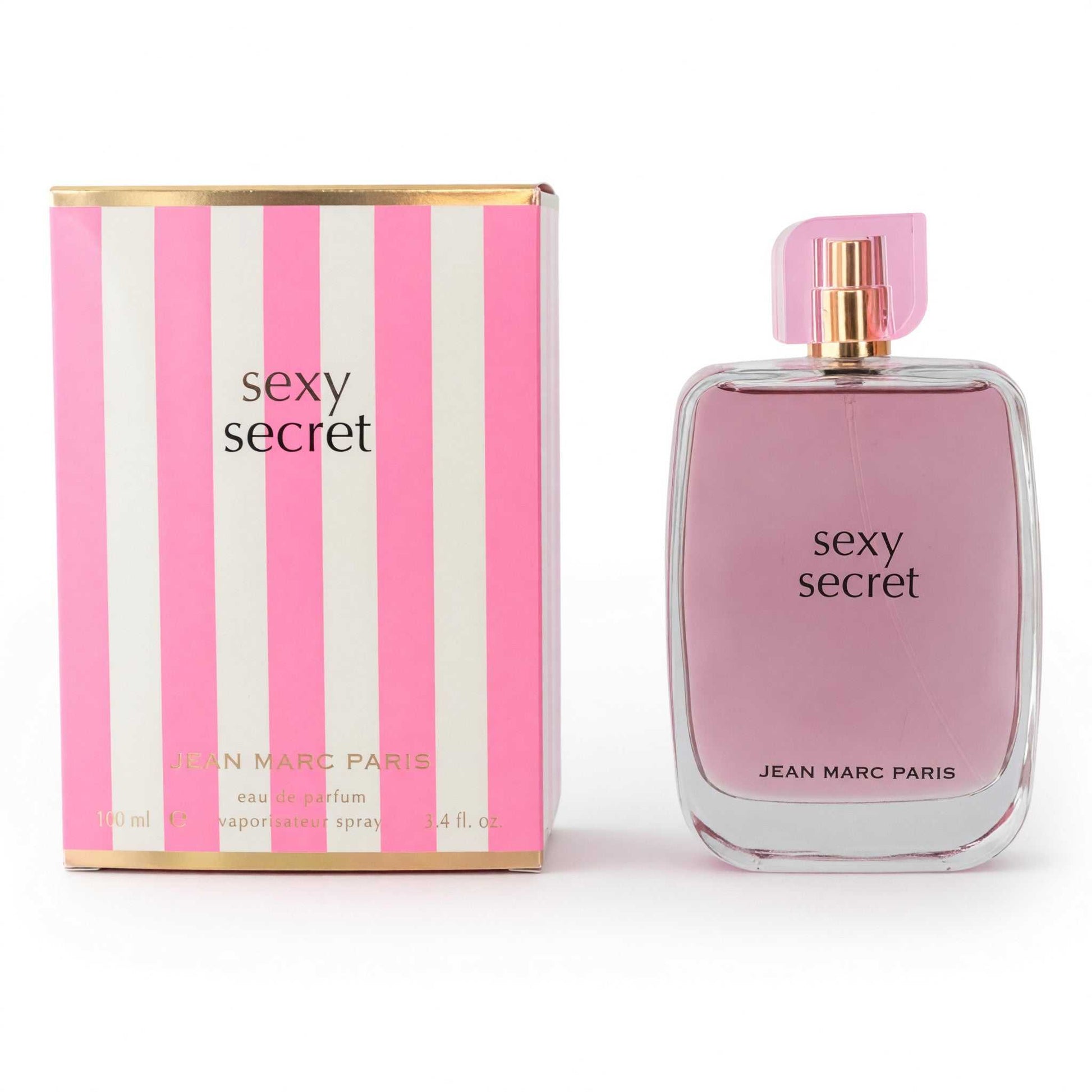 Women's eau de parfum spray set: pink glass bottle with gold cap and striped box