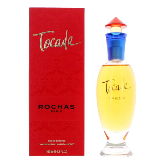 Red Tocade by Rochas perfume box and blue glass spray bottle