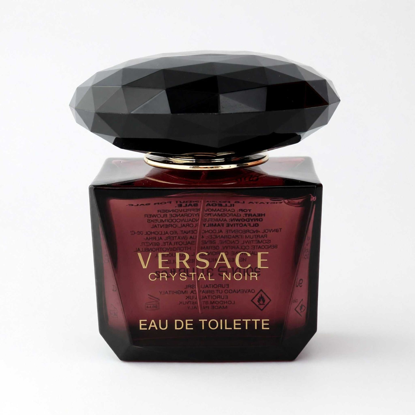 Faceted dark Versace Crystal Noir eau de toilette spray bottle