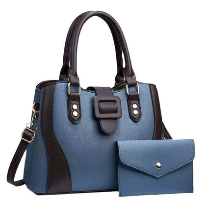Blue faux-leather tote bag with black trim and matching envelope clutch pouch