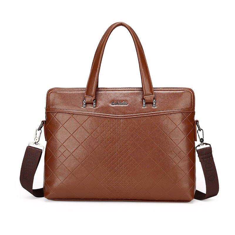 Brown leather briefcase with quilted diamond panel, top handles and shoulder strap