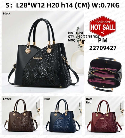 Black stone-pattern tote bag with gold hardware and hanging tassel charm