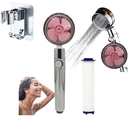 Chrome handheld shower head with pink rotor face and filter cartridge
