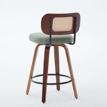 Swivel counter stool with light green seat, cane rattan back, black swivel frame and base