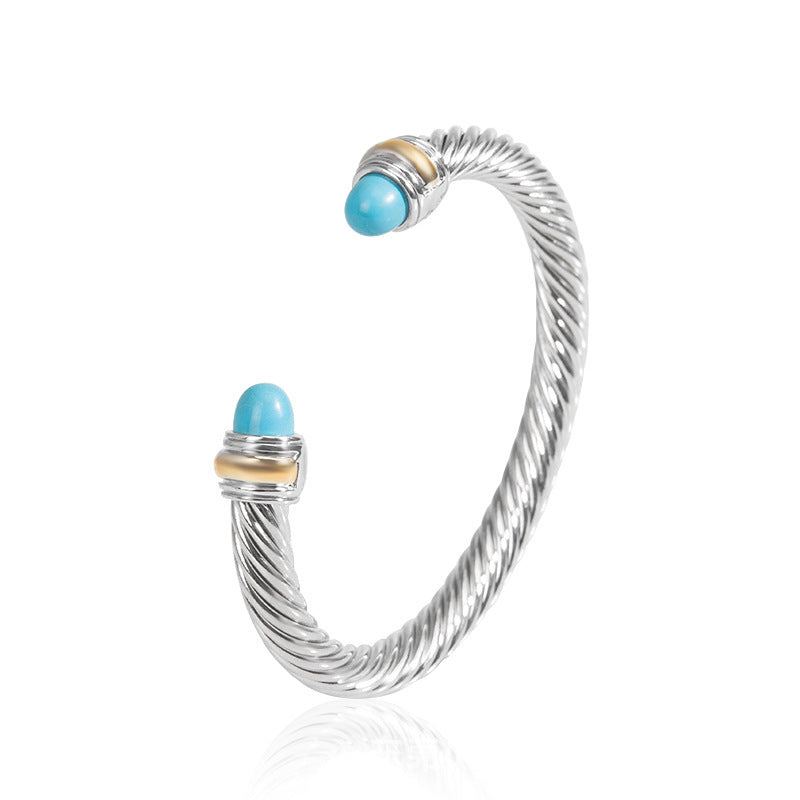Bohemian bracelet with silver wire and turquoise cabochon beads with gold accents