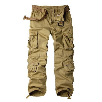 Men's cargo pants in tan with multiple flap pockets and adjustable strap at waistband