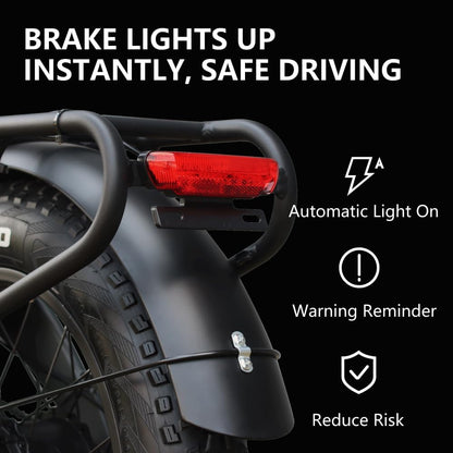Red rear brake light and reflector on a grey electric dirt bike