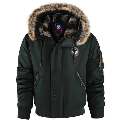 Dark green winter jacket with fur-lined hood on a white background