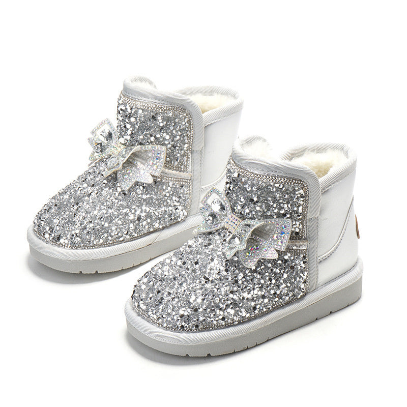 Silver glitter velvet padded cotton shoes with bow and rhinestone detail, side view
