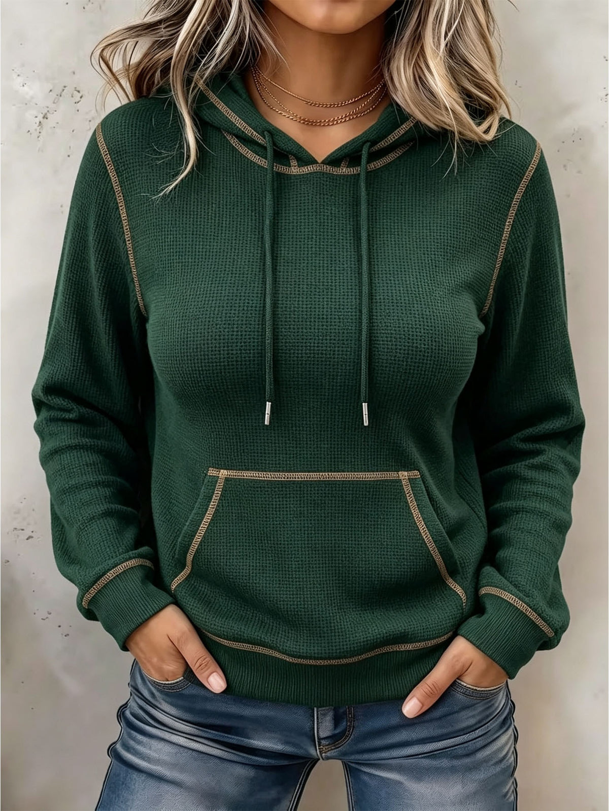 Forest green long-sleeve hoodie with drawstring hood and front kangaroo pocket