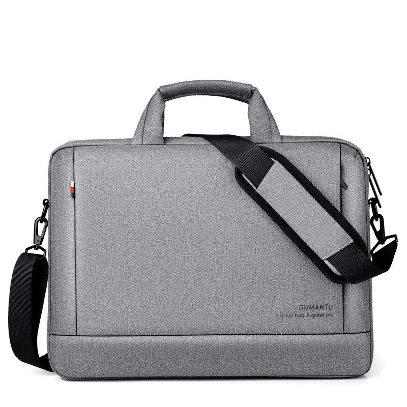 Light grey laptop bag with top handle and diagonal shoulder strap with webbing