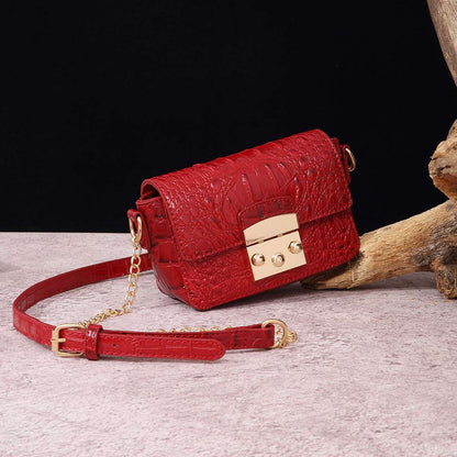 Red croc-textured crossbody bag with flap, gold hardware, and chain strap