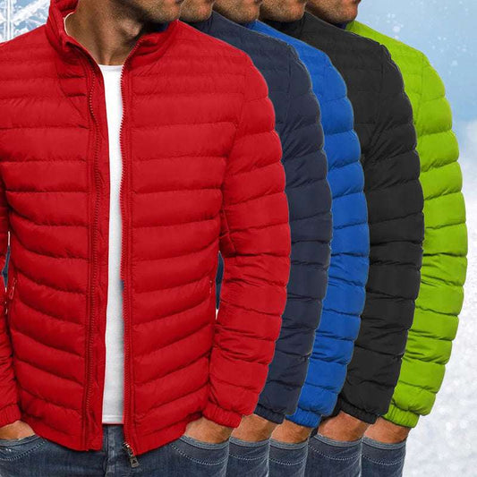 Red, blue, black, and green puffer jackets displayed on a person against a snowy background.