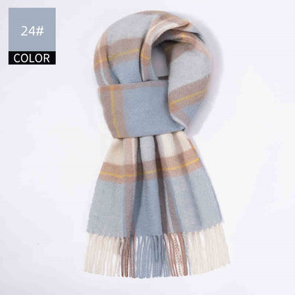 Plaid scarf with gray, beige, and white colors on a light gray background