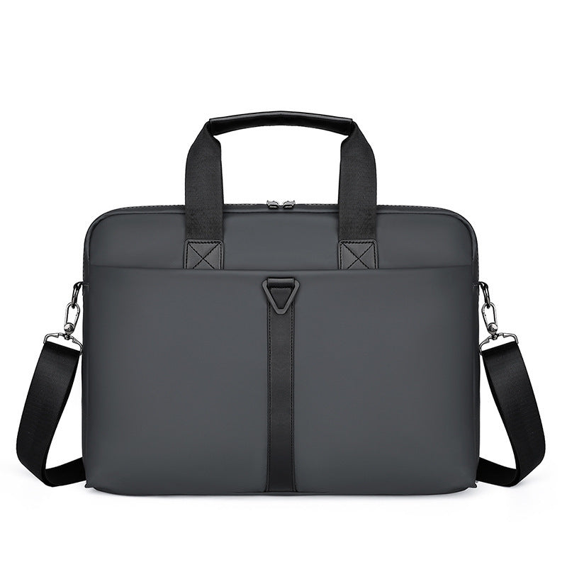Dark gray PU briefcase bag with dual handles, front emblem, and shoulder strap