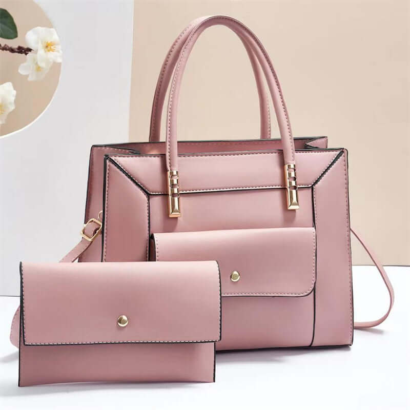 Powder pink tote bag set with top handles and matching mini crossbody bag