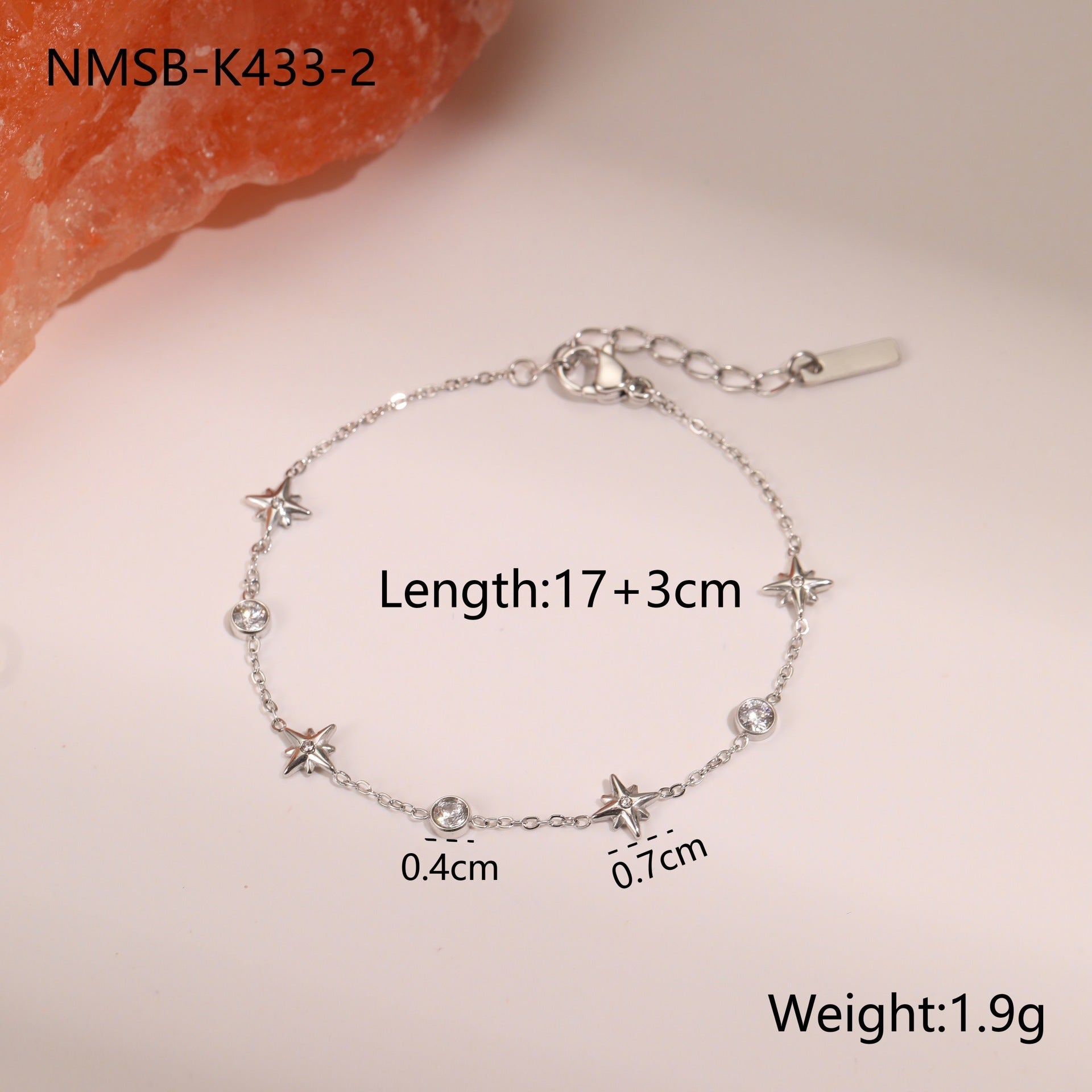 Silver-tone zircon star charm bracelet with toggle clasp and small sparkle stones