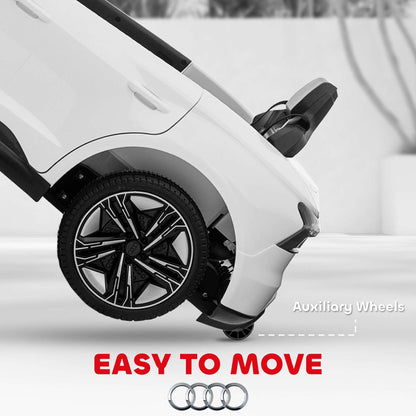 White kids ride-on car rear wheel detail with auxiliary wheels and fender guard