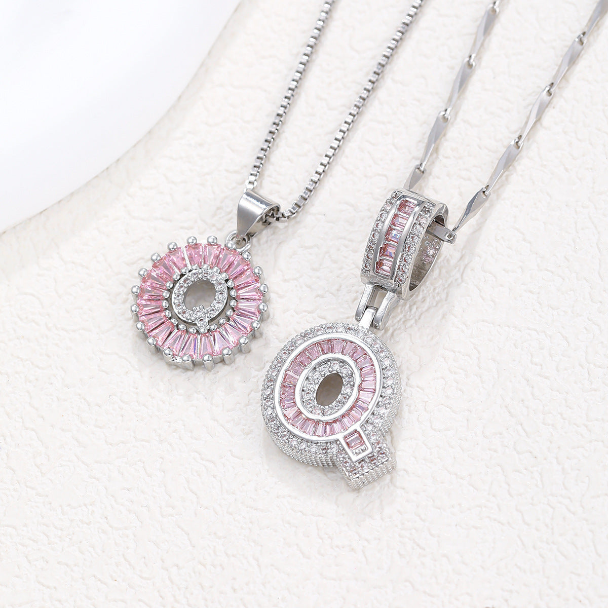 Silver pendant necklace set with pink crystal flower charm and letter pendant, two necklaces together
