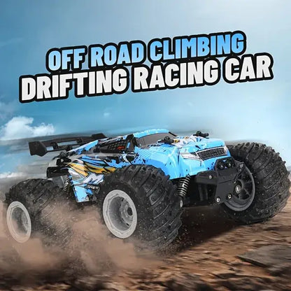 Blue off-road RC toy truck with large wheels and raised suspension on dirt