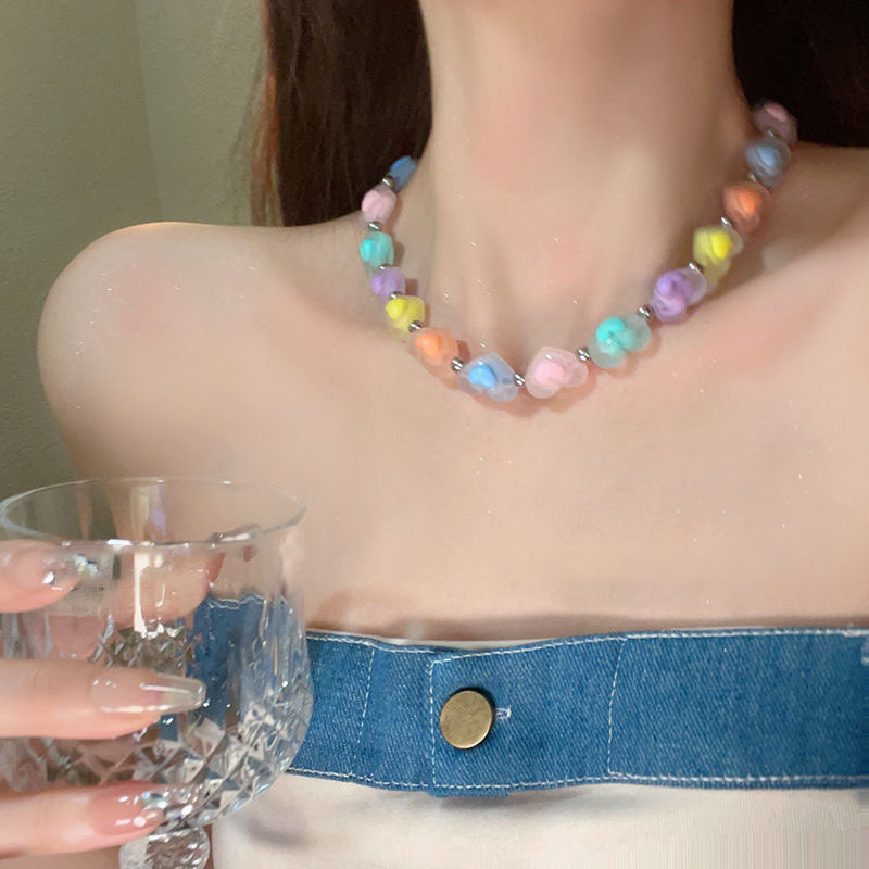 Butterfly pearl necklace with multicolor bead strand and small pearl details