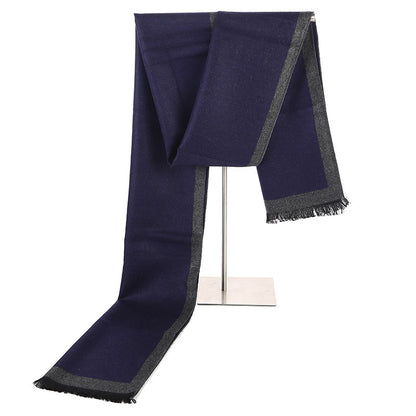 Navy blue scarf with gray edges draped over a metallic stand on a white background