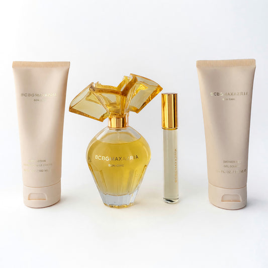 4-piece women’s fragrance gift set with gold perfume bottle, lotion tubes, roll-on