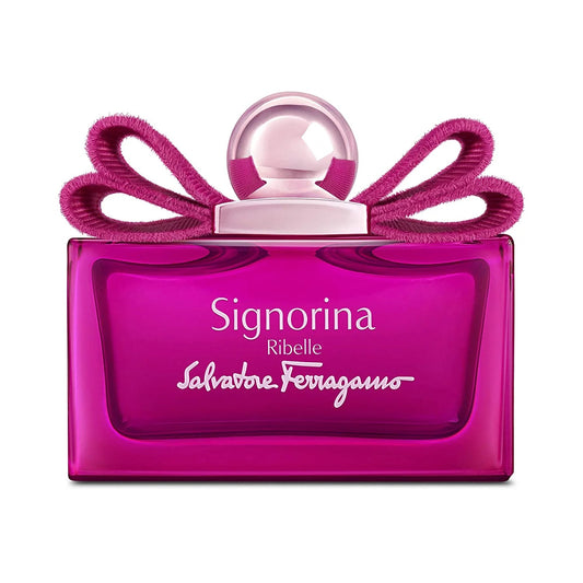 Women's eau de parfum bottle with magenta glass and decorative pink bow cap