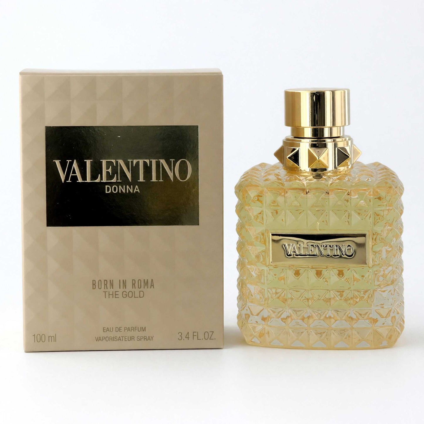 Valentino Donna Born in Roma The Gold EDP spray bottle with gold cap and patterned glass