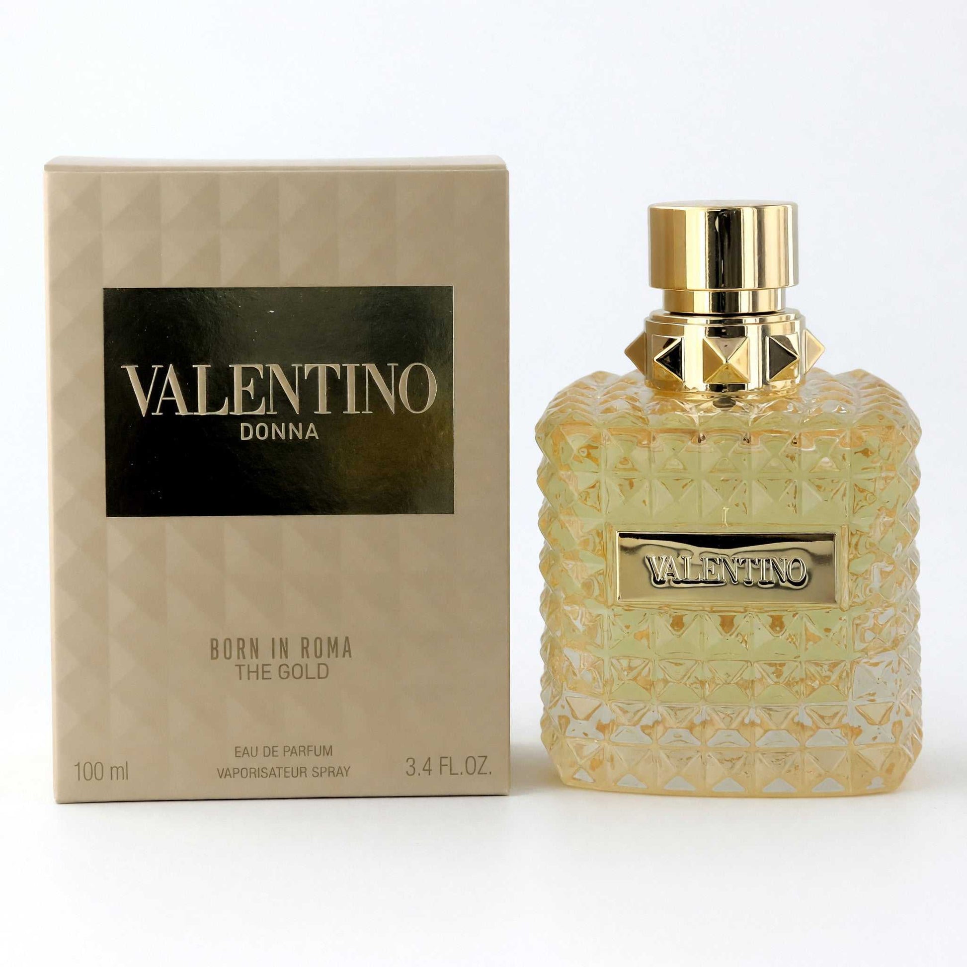 Valentino Donna Born in Roma The Gold EDP spray bottle with gold cap and patterned glass