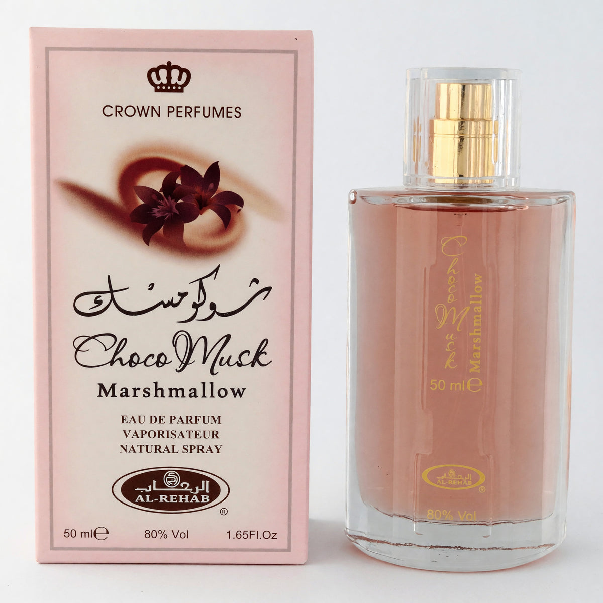 Eau de parfum spray bottle with pink glass and matching perfume box