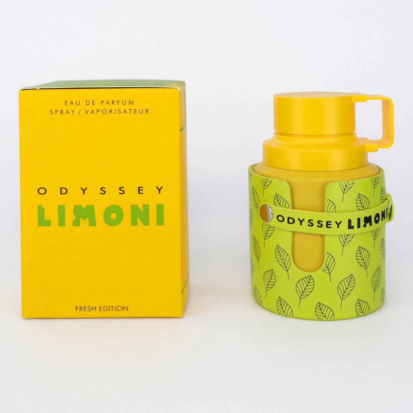 Yellow EDP spray perfume bottle with leaf pattern and matching box