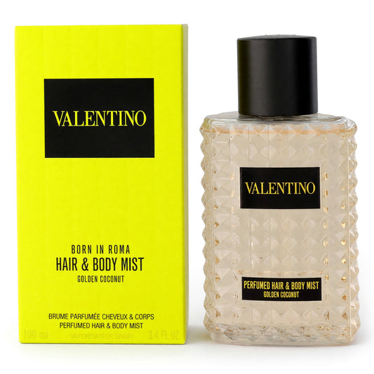 Hair & body mist bottle with black cap, clear gold liquid, textured glass