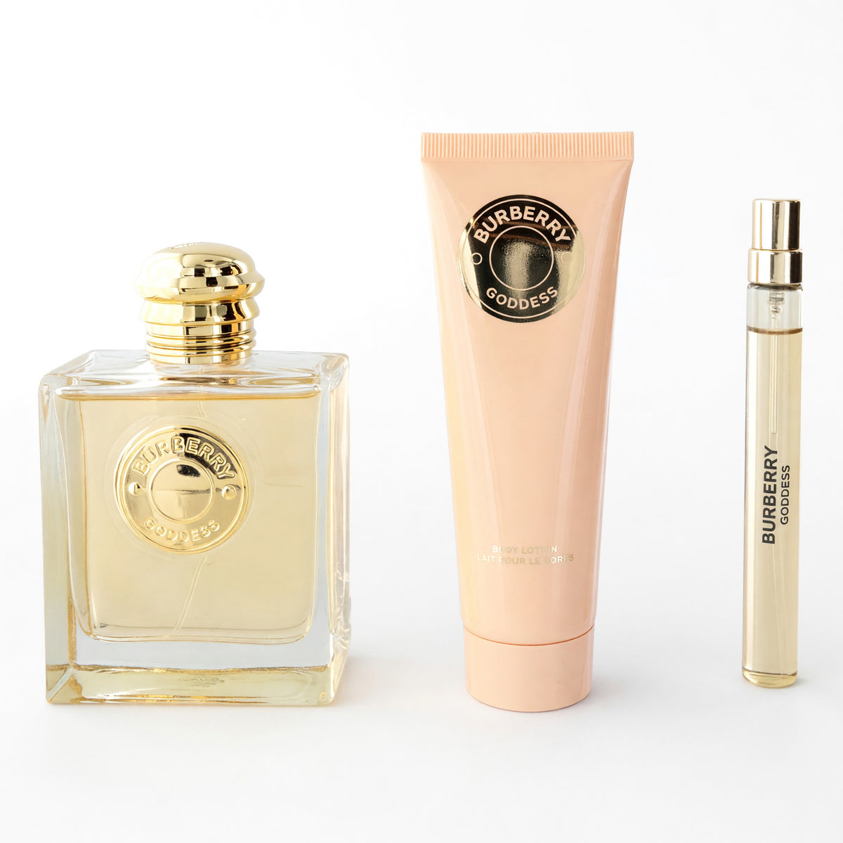 3-piece Burberry Goddess perfume set: glass bottle, squeeze tube, and travel spray vial