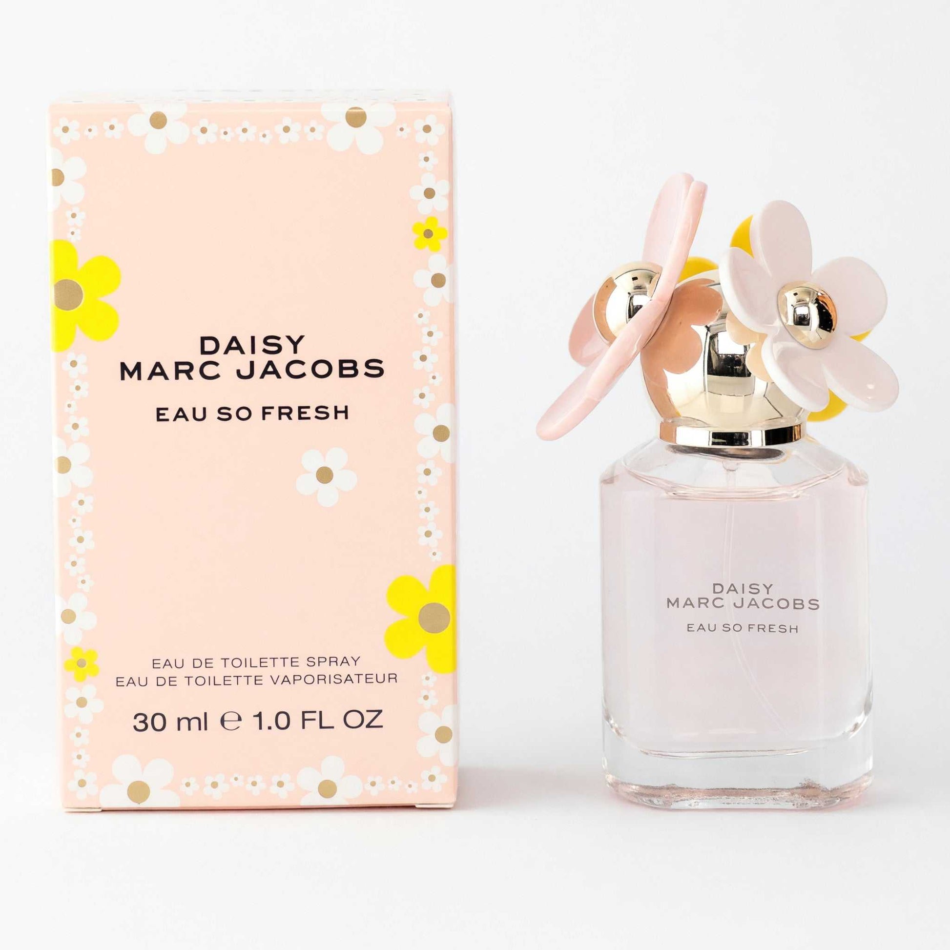 Women's Daisy Marc Jacobs Eau So Fresh EDT spray bottle with flower-shaped cap, in box.