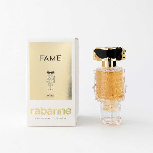 Women's eau de parfum spray bottle with gold cap, shown with retail box.