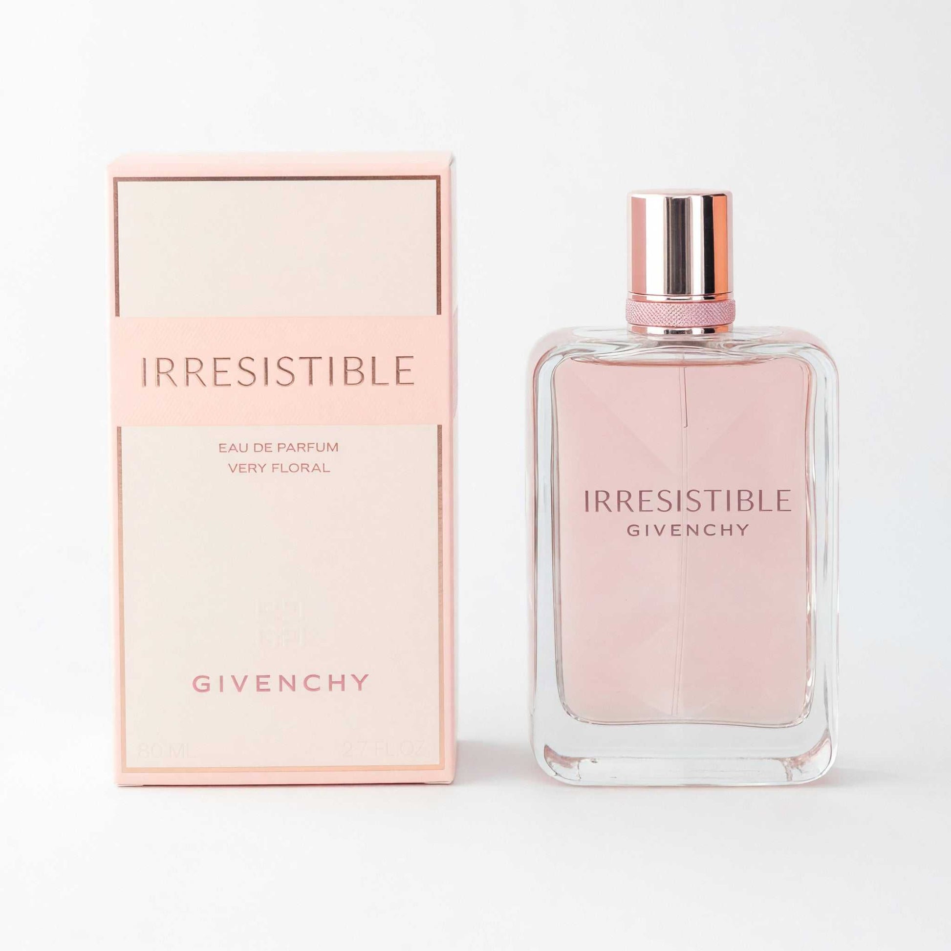 Givenchy Irresistible women's floral eau de parfum spray set: pink glass bottle, cap, box