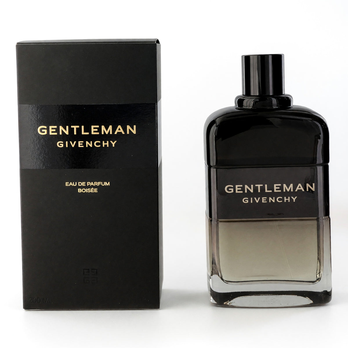 Givenchy Gentleman eau de parfum spray for men, black glass bottle with gold label