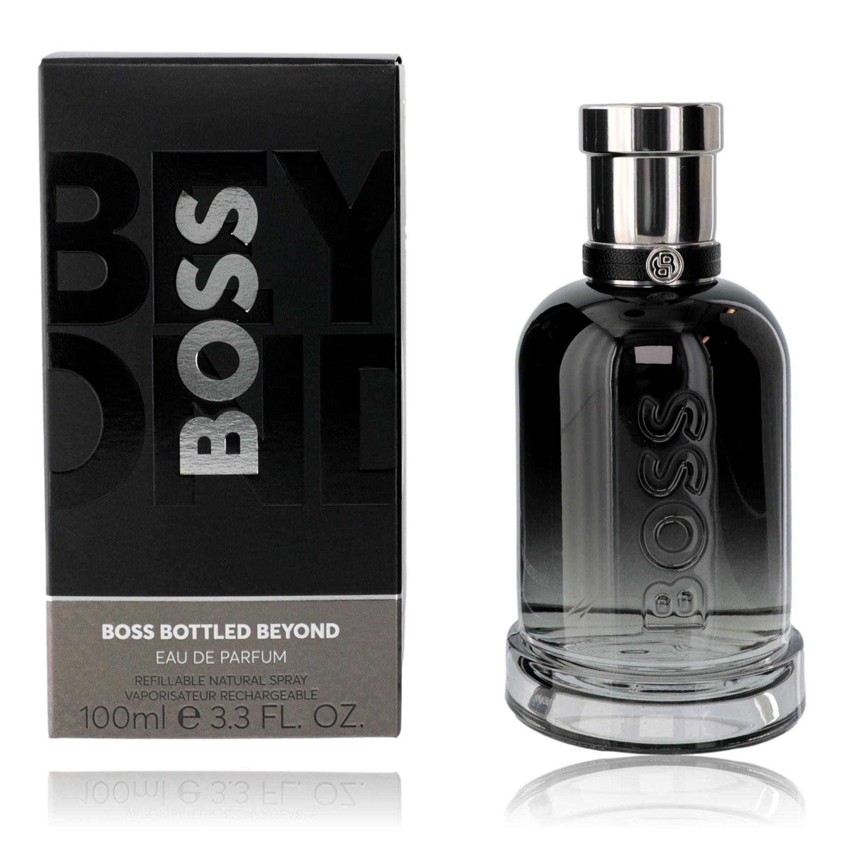 Men's eau de parfum spray bottle with black glass and silver cap, shown with box.