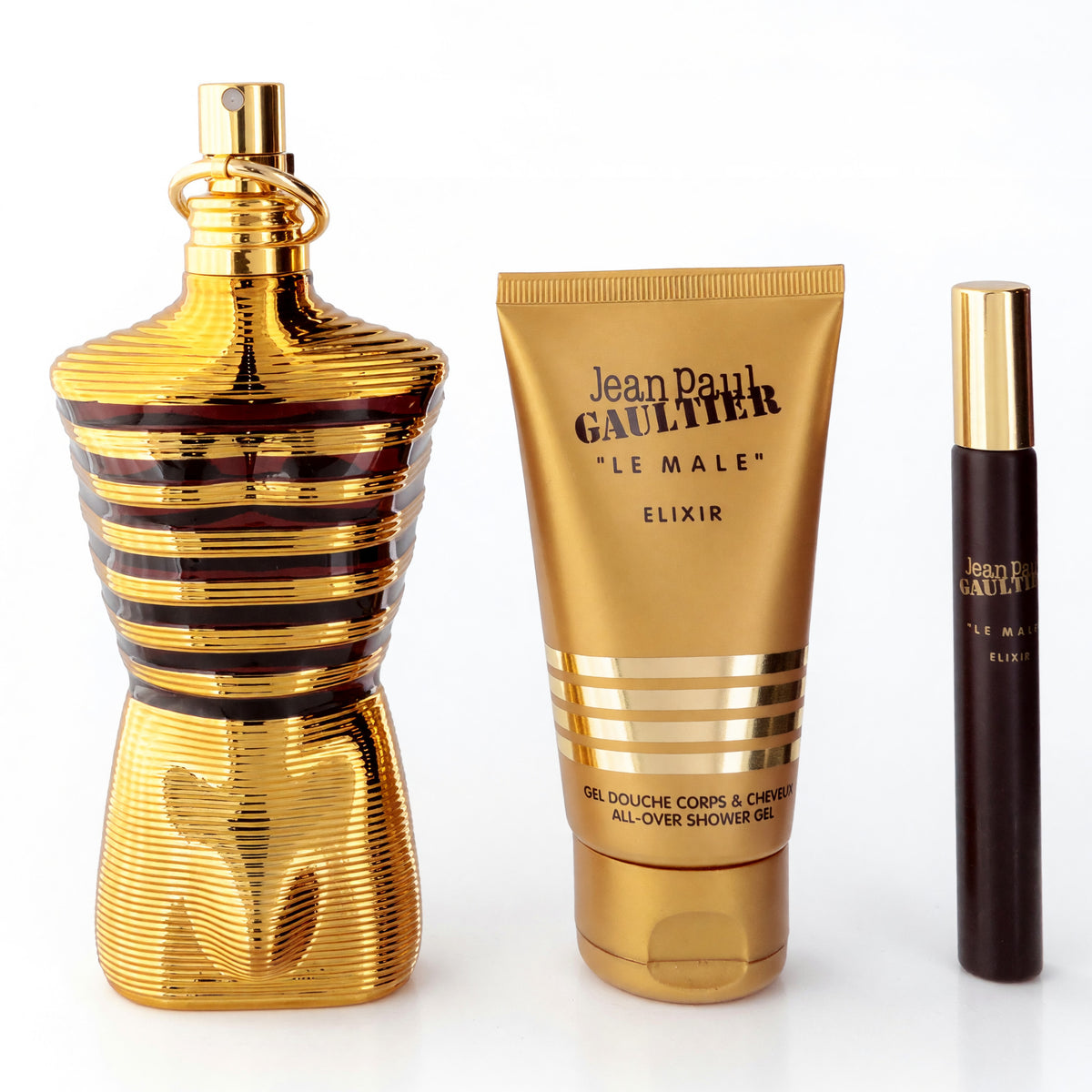 Men's fragrance gift set with gold bottle, gold shower gel tube, and dark rollerball
