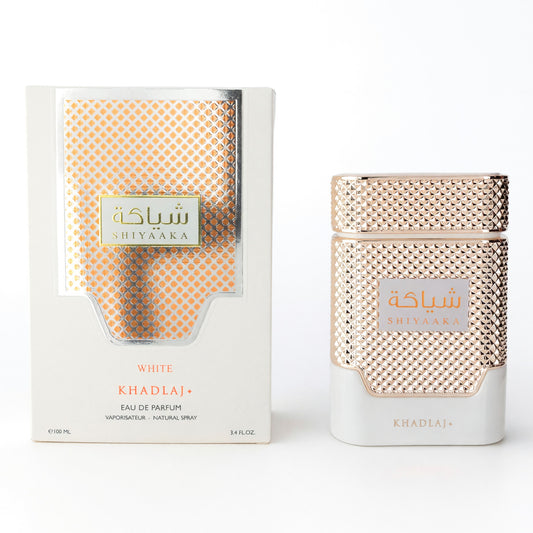 Men's white EDP spray bottle with gold textured cap, shown with retail box.