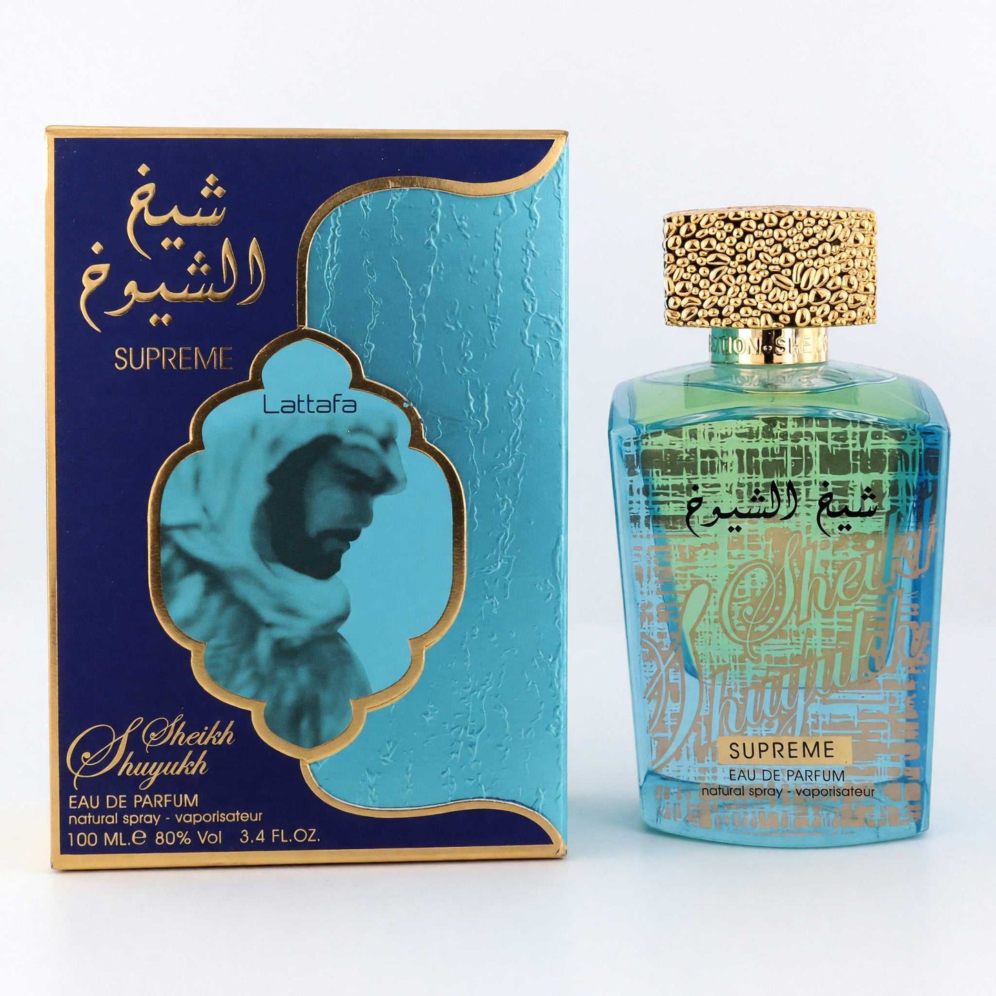 Lattafa Supreme perfume EDP spray bottle with gold patterned cap, beside product box