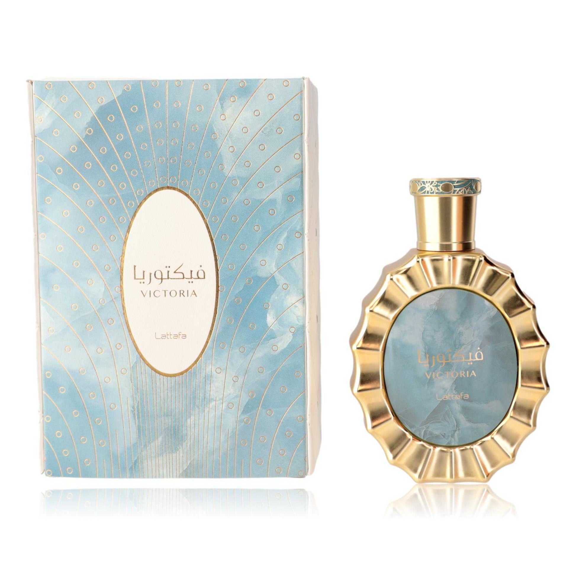 Eau de parfum spray set with blue patterned box and gold-capped bottle