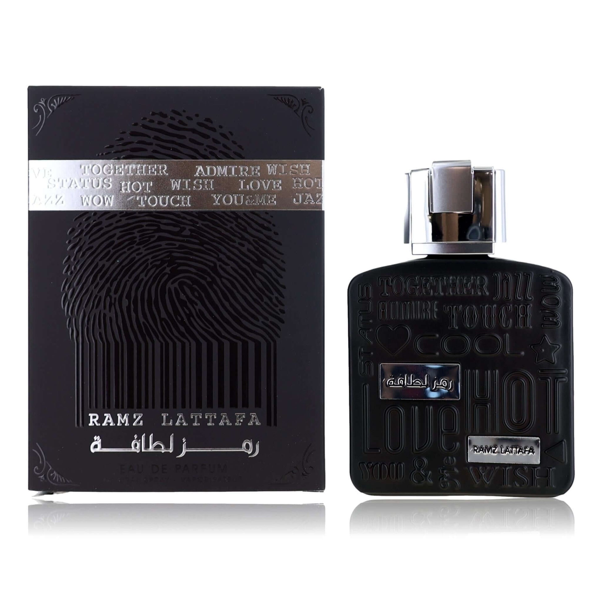 Ramz Silver perfume spray with dark bottle and silver cap, shown with matching box