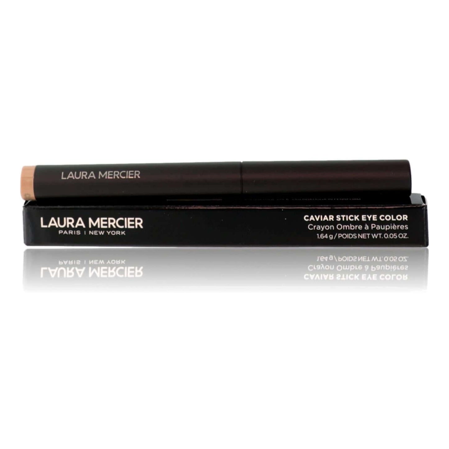 Caviar Stick eye color in caramel, long black twist-up eyeshadow stick